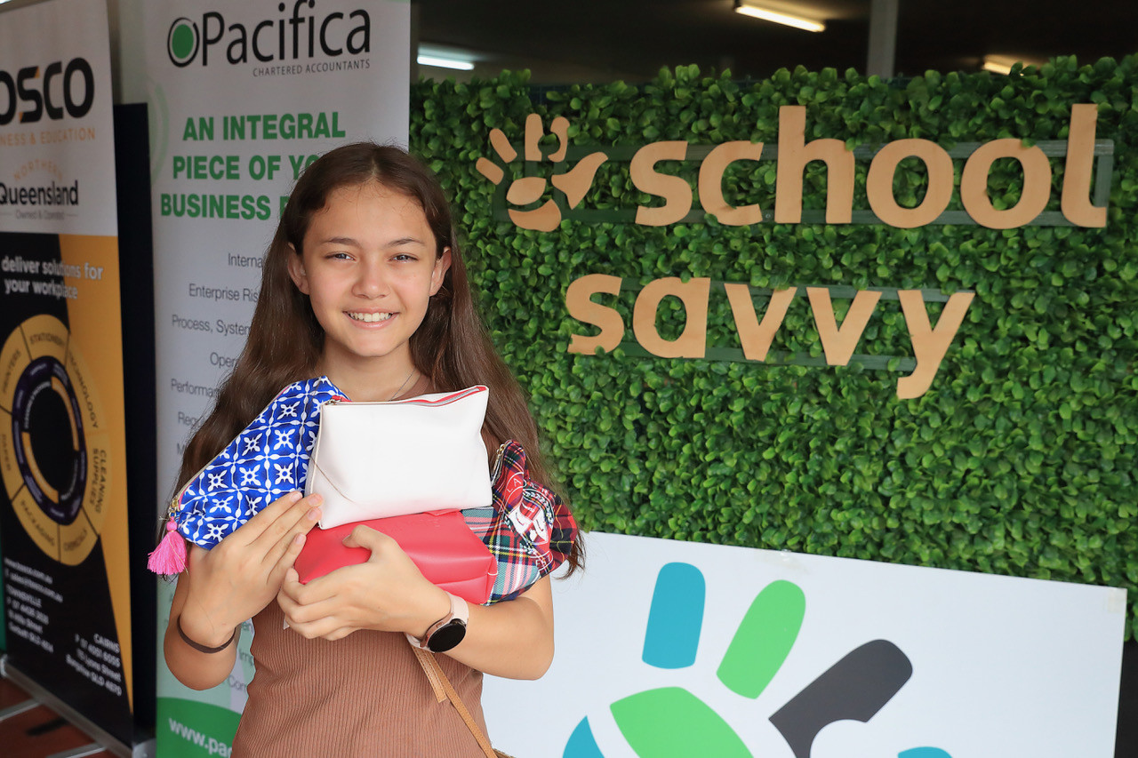 Jessica Millward with a pencil case obtained from a School Savvy pop-up hub. Picture: Supplied