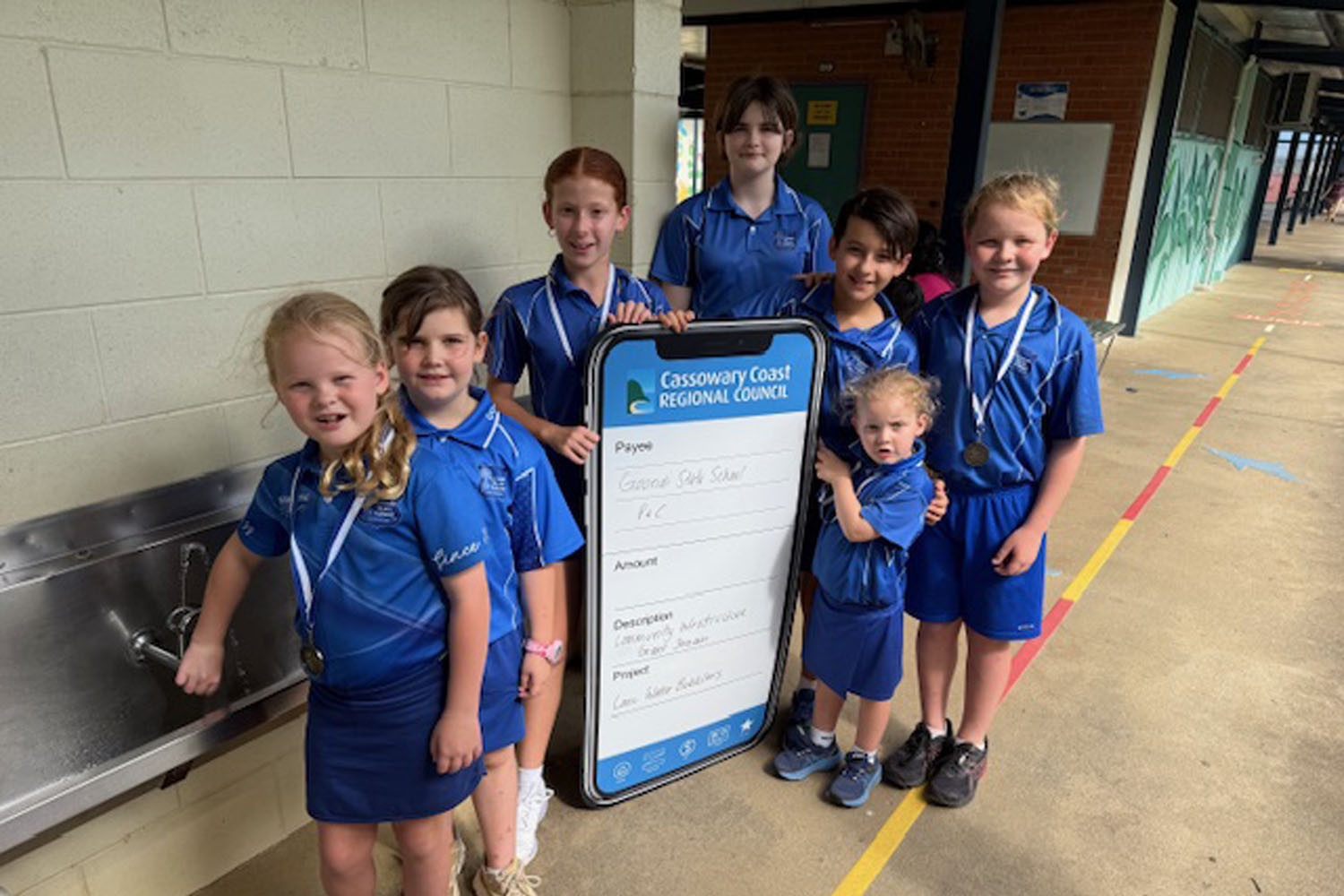 Children at Goondi State School are happy that Cassowary Coast Regional Council has paid for their cold water fountains. Picture: Cassowary Coast Regional Council