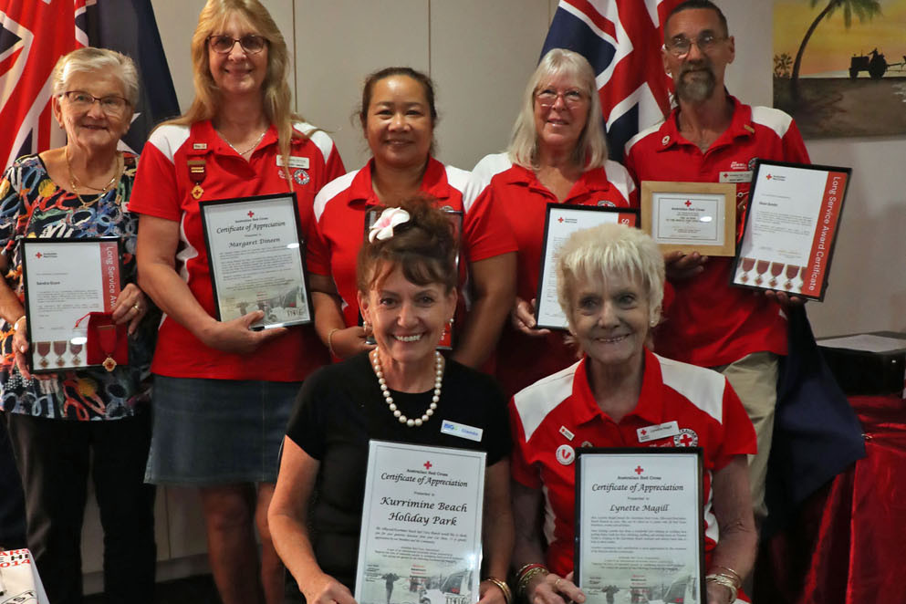 Red Cross members and who received long service, medals, awards and appreciation certificates (back, from left) Sandra Grant, Margaret Dineen (Deluxe Trophies), Chantra (Sal) Cavey, Jill Calnan and Sean Smith, and (front, from left) Glenda (Kurrimine Beach Holiday Park) and Lynette Magill. Picture: Maria Girgenti