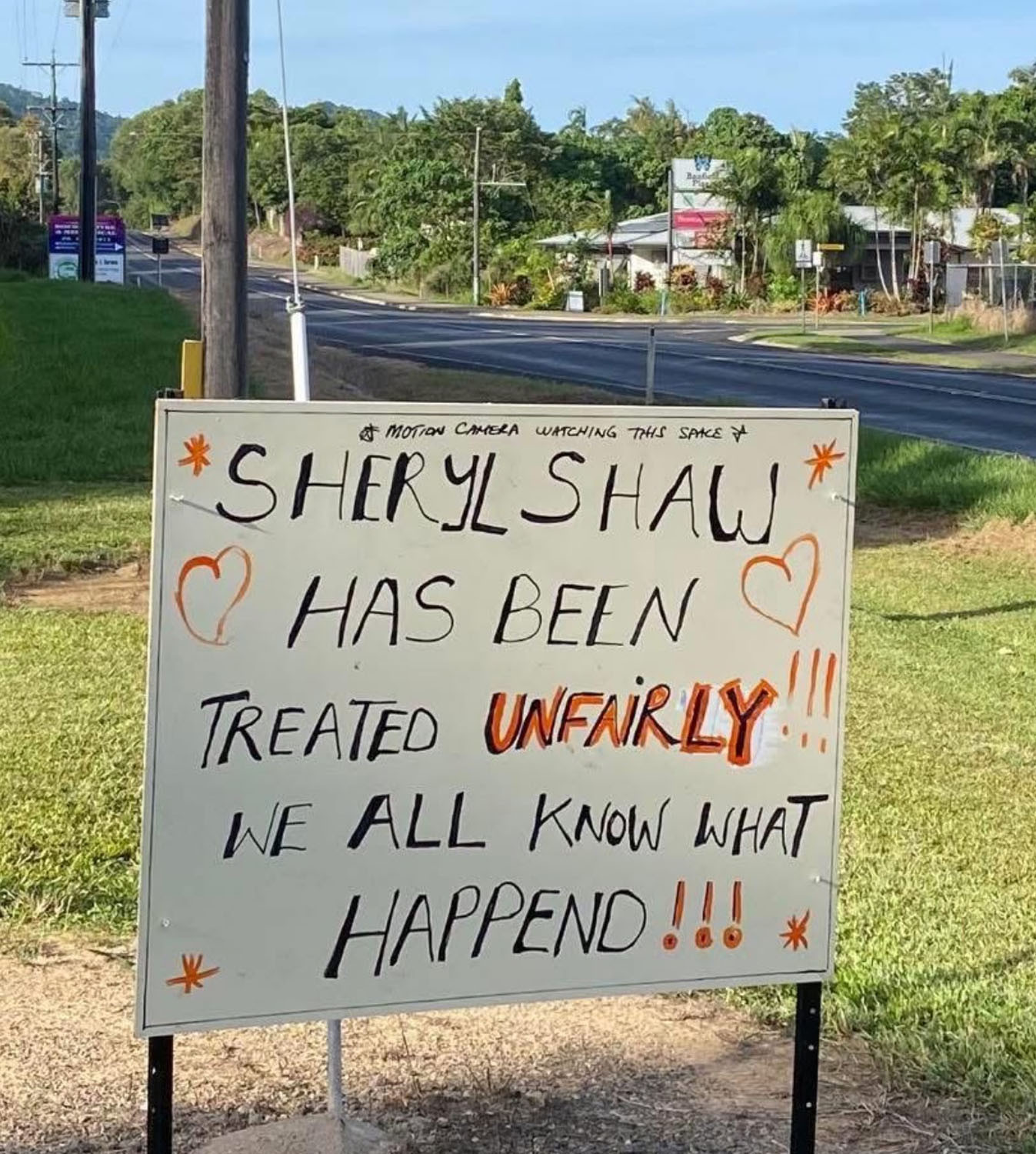 One of several signs put up near Mission Beach State School in support of Mrs Shaw. Picture: Supplied