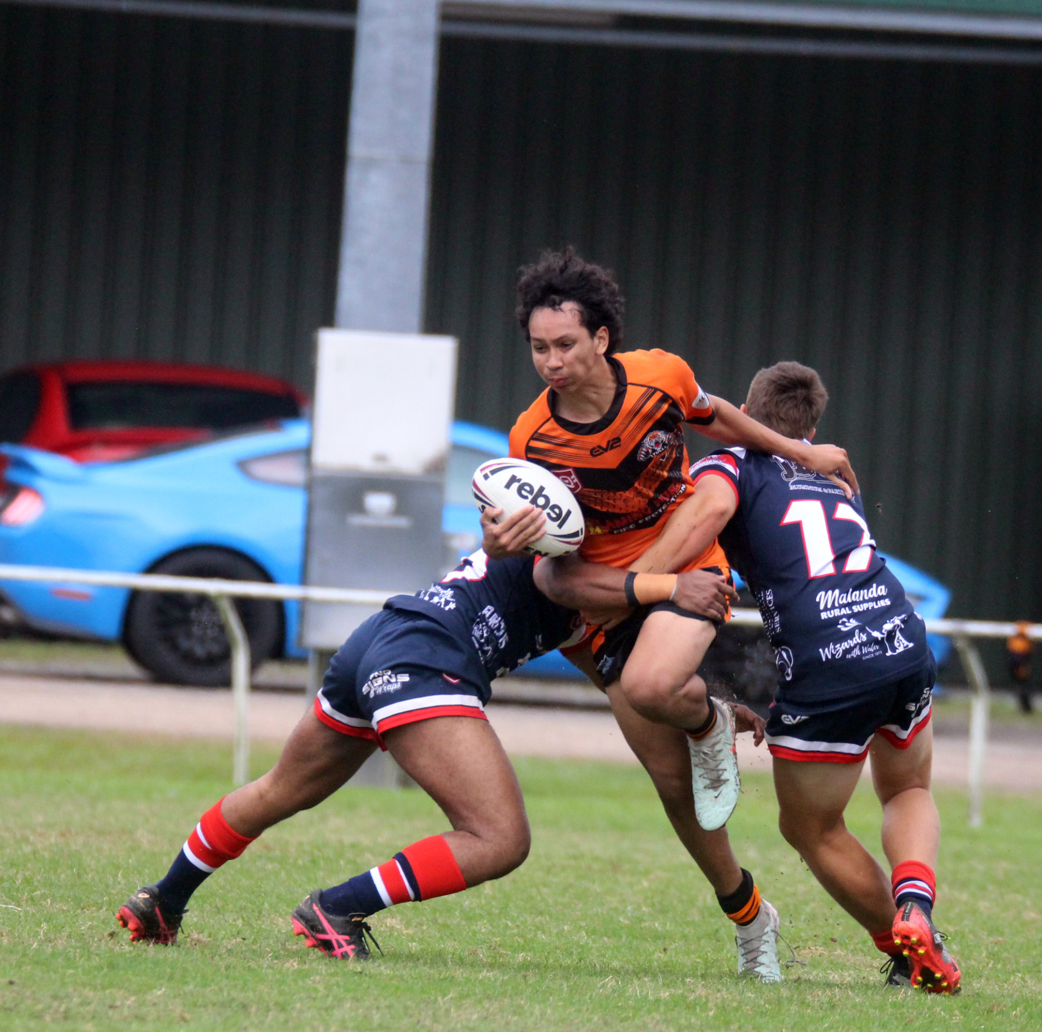 Tully’s Peter Solien ran into solid Atherton defence in the Under 19 clash. Picture: Maria Girgenti